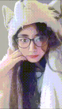 Girl in cat hat shows milk