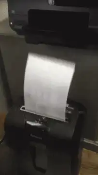 Printer ejects paper into shredder