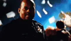 Officer Don Cheadle Smirking