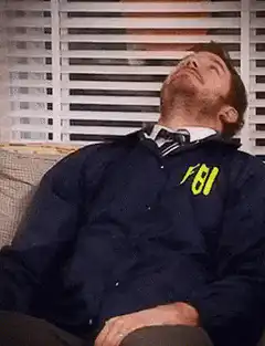 FBI Agent Falls Asleep on Couch