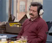 Ron Swanson nodding with headphones