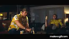 Two men in yellow shirts relaxing