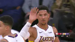 Lakers players high five on court