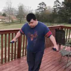 Man on deck with blue bat