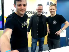 Three men posing for a selfie