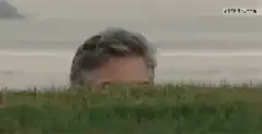 George Clooney rising from grass