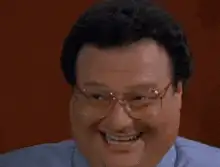 Archie Bunker laughing