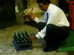 Man stacking beer bottles