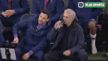 Jose Mourinho and assistant coach celebrate on sidelines