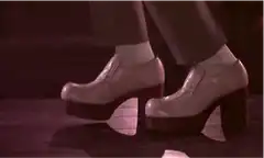 white platform shoes tapping