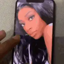 Woman swipes on phone then looks up