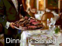 Waiter serving platter of steak