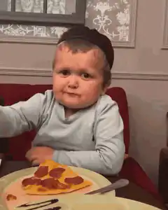 Baby in kippah drinking soda with pizza
