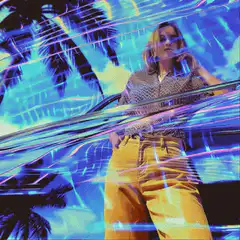 Woman in yellow pants with neon palm trees