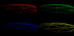 Four colored wireframe spheres rotating