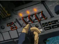 Hand flipping switches on a control panel