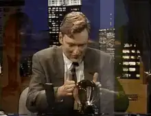 David Letterman holding a blender