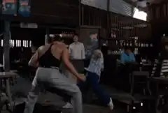 Martial artist kicks man in bar