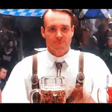 Man in lederhosen eating a pretzel