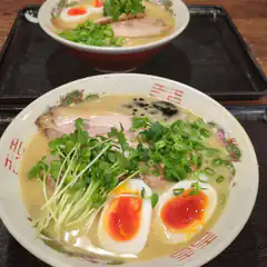 Two bowls of ramen with soft boiled eggs