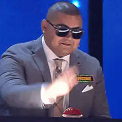 Man in suit slams red buzzer