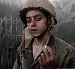 Private Ryan smoking in the rain