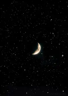 Crescent Moon in Starry Night Sky