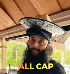 Bearded man wearing two hats all cap