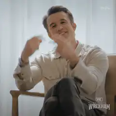 Rob McElhenney peace signs