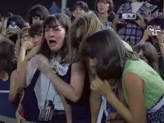 Beatle Girl Screaming in Crowd