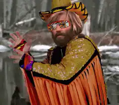 Man in colorful outfit and star sunglasses
