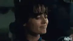 Woman smirking and pursing lips