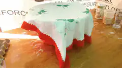 Tablecloth reveal of a red bowl