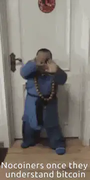 Baby in blue robe dancing with sunglasses