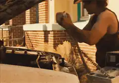 Man blown back by car engine explosion