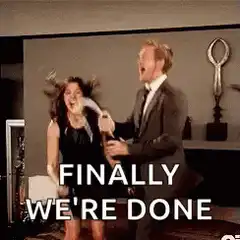 Man and woman celebrating with champagne