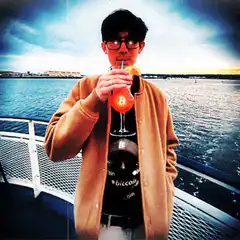 Man drinking bitcoin cocktail on boat
