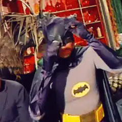 Batman winks at the camera