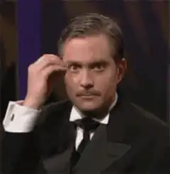 Man in tuxedo mind blown