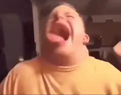Man screaming with tongue out