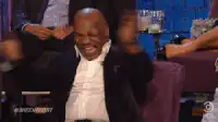 Mike Tyson laughing and dancing