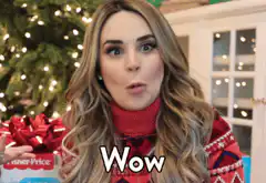 Woman saying wow in Christmas sweater