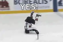 Hockey player celebrates with YES text