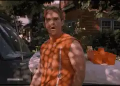 Man in orange shirt shocked by shadows