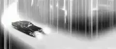 black car speeding through rain