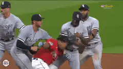 Baseball players arguing on field