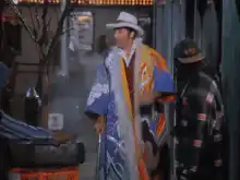 Elvis Presley in a colorful robe