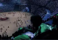Crowd cheering at a football match