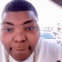 Man with blue eyes making funny faces