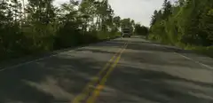 RV driving down a country road